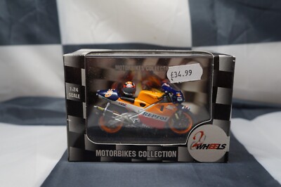 ONYX - 1999 HONDA NSR500 - TADY OKADA - MODELL RENNRAD IM MASSSTAB 1:24 - TWR036