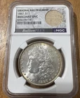 1887 Original Bag Fragment Toned Morgan Silver Dollar $1 NGC BU Brilliant UNC