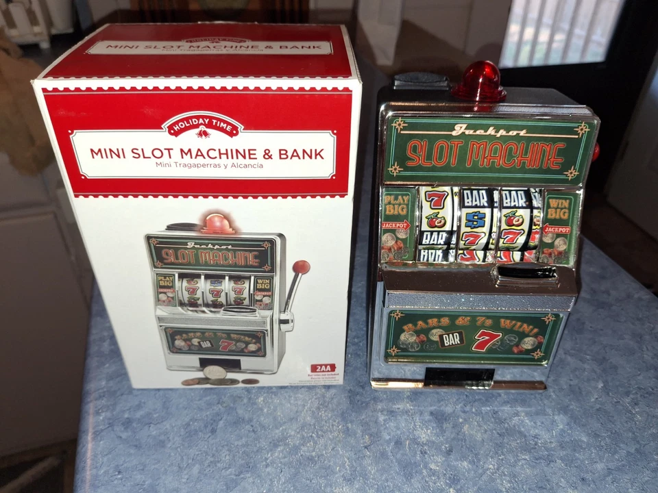 Banco Mini máquina tragamonedas Holiday Time - Luces y sonido - Palanca de tracción. Caja abierta nueva Foto 2 de 4