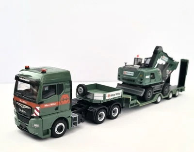 Herpa Max Wild  MAN TGX GM Tiefladesattelzug und Liebherr Mobilbagger A920 1:87 - Bild 1 von 4