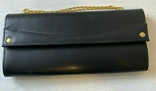 Next Black Eevening Shoulder Bag with Purple Lining and Gold Chain Strap.