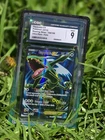 2015 Rayquaza EX 104/108 CGC 9 Grade Pokemon TCG  Roaring Skies with GradeGuard
