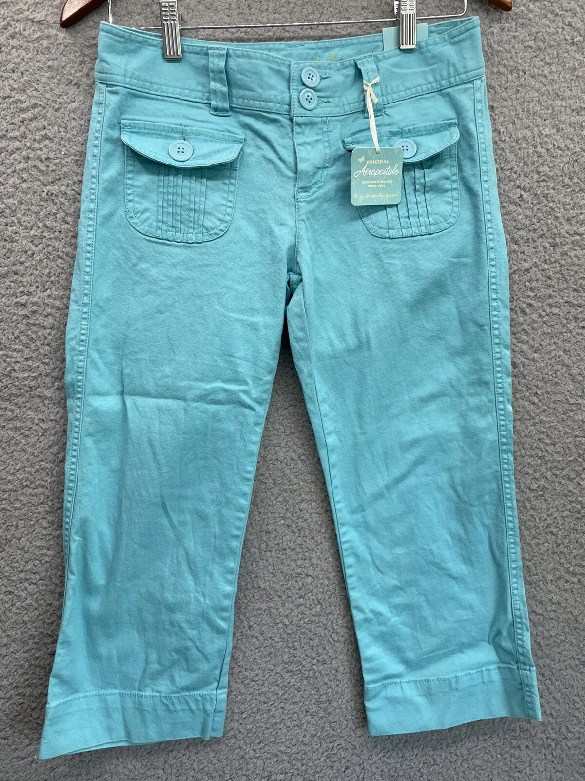 🔥 Original Aeropostale • Button Capri Pants • Aqua Teal Green • Women Sz 1/2
Opens in a new window