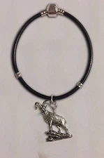 code A54 Ibex charm on a silver Faux Leather Snake Bracelet 