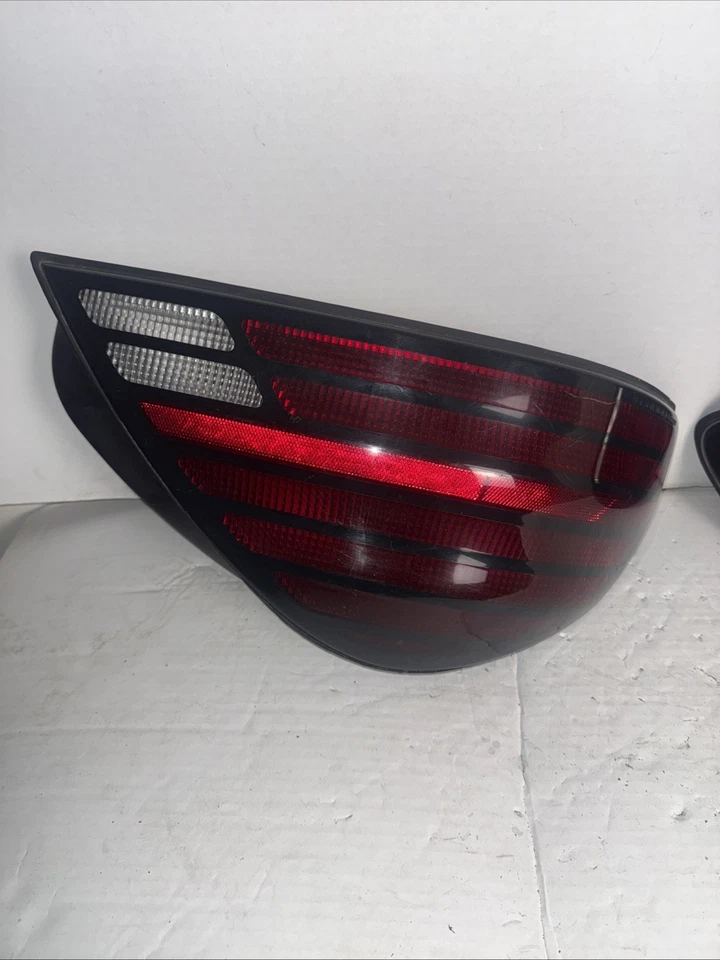 Luz trasera izquierda Pontiac Grand AM 1999 2000 2001 2002 2003 2004 2005 OEM Foto 2 de 4