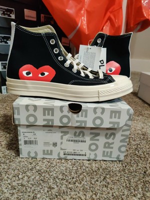 black chucks with red heart