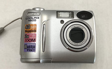 Nikon Coolpix E4600 4.0 Megapixels 3x Zoom Red-Eye Fix Digital Camera
