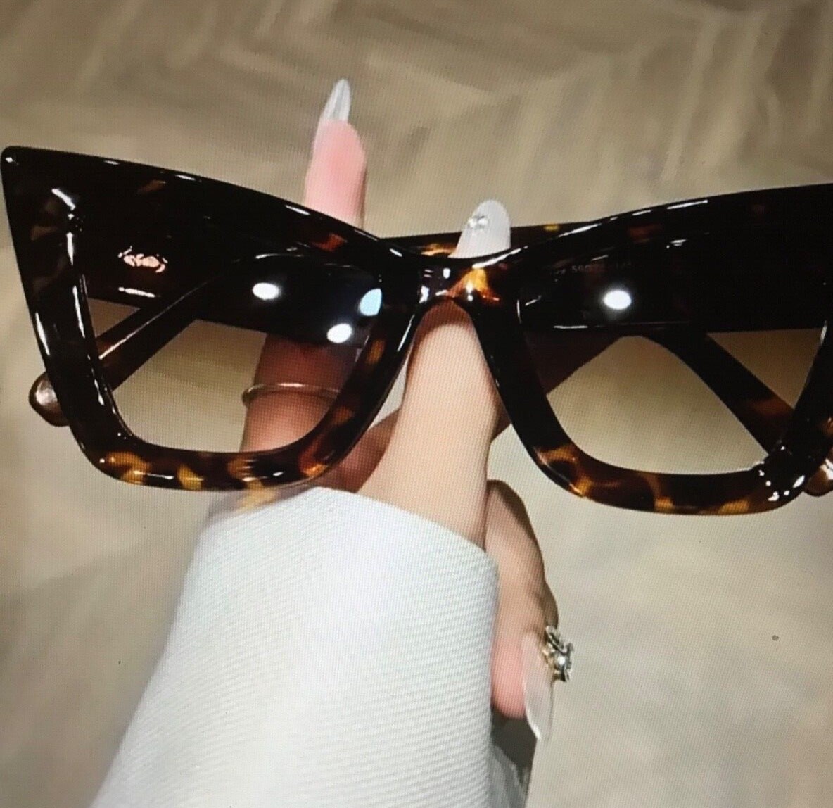 Black Cat-Eye Sunglasses with Striped Plastic Frames-image