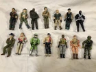 Collection  of GI Joe figurines, vehicles, weapons, accessories, and sundries.