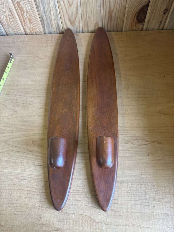 A pair of Danish-inspired surfboard candle wall sconces at 24" tall — sculptural, warm, and the exact kind of find that makes an interior look effortlessly curated.