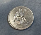 One Troy Oz .999 Fine Silver round with Seated Liberty OBV, Shield REV