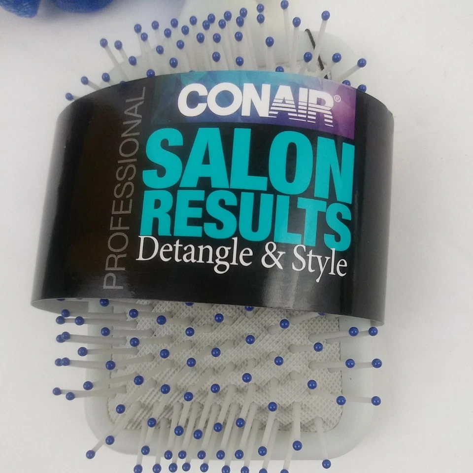 Cepillo exfoliante con paleta estilo desenredante resultados de salón profesional Conair Foto 2 de 4