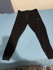 Black Puma leggings with white logo and back waist inside pocket. size XL