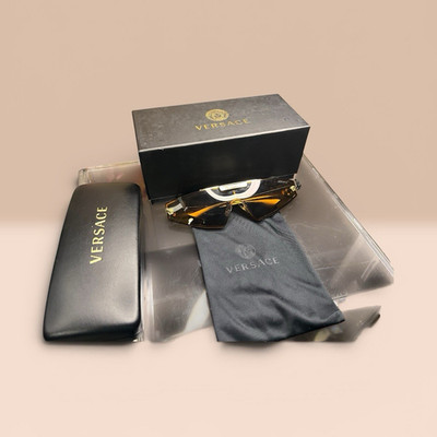 Versace Women s 8051 Shield Sunglasses Rimless Gold Metal Brown Tinted UV400