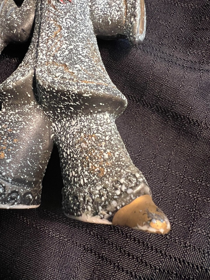 Asian boy figurine gold paint accents rough texture glossy hair & face