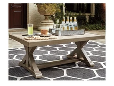 Ashley Furniture Beachcroft Outdoor Patio Coffee Table w/Trestle Base in Beige