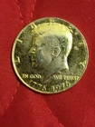 1976 P Plated Kennedy Half Dollar Coin - circulated