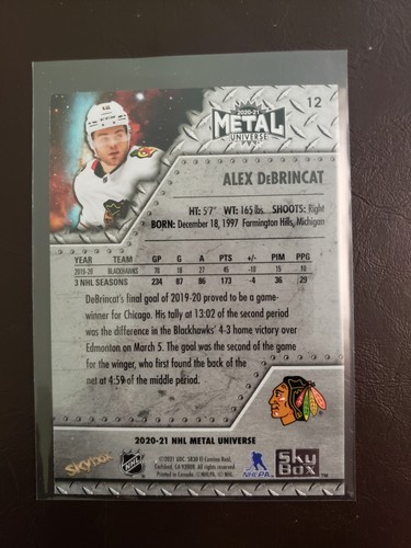 2020-21 Alex DeBrincat Blue Spectrum Skybox Metal Universe Hockey Chicago... - Picture 2 of 2