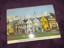 Postcard, San Fransisco Victorian Houses W Skyline, uncirculated vintage sleeved