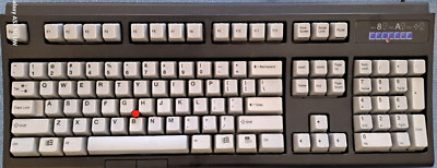 UNICOMP computer keyboard with TrackPoint 