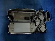 Steam Deck OLED 1TB SSD, 512GB MicroSD, DBrand Case, and Steam Docking Station.