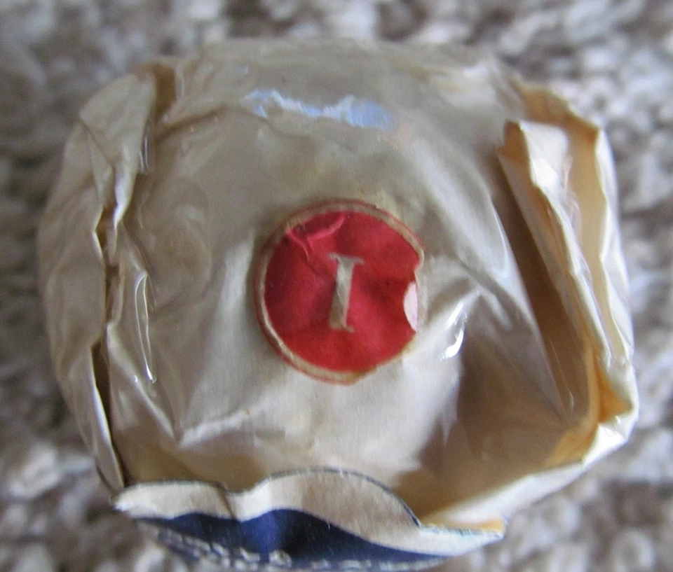 PELOTA DE GOLF DE MALLA ENVUELTA VINTAGE CON SELLO ORIGINAL-C. G. A. Foto 2 de 4