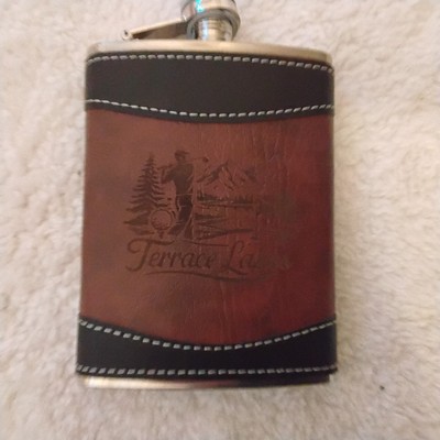 Small Flask From Terrace Lakes Resort With Brown Covering