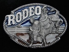 QI01110 VINTAGE 1991 BULL RIDER RODEO WESTERN COWBOY DESIGN BELT BUCKLE