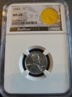 1943 STEEL WHEAT CENT NGC GRADED  MS 66 WITH PARACHUTE FRAGMENT