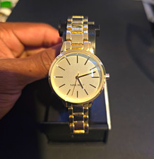 Nine West Women’s Analog Gold Tone Metal Bracelet Watch Gold Dial Stick Seconds