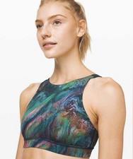 Lululemon High-Neck Energy Bra features a "Cosmic Shift Multi" pattern Size 12