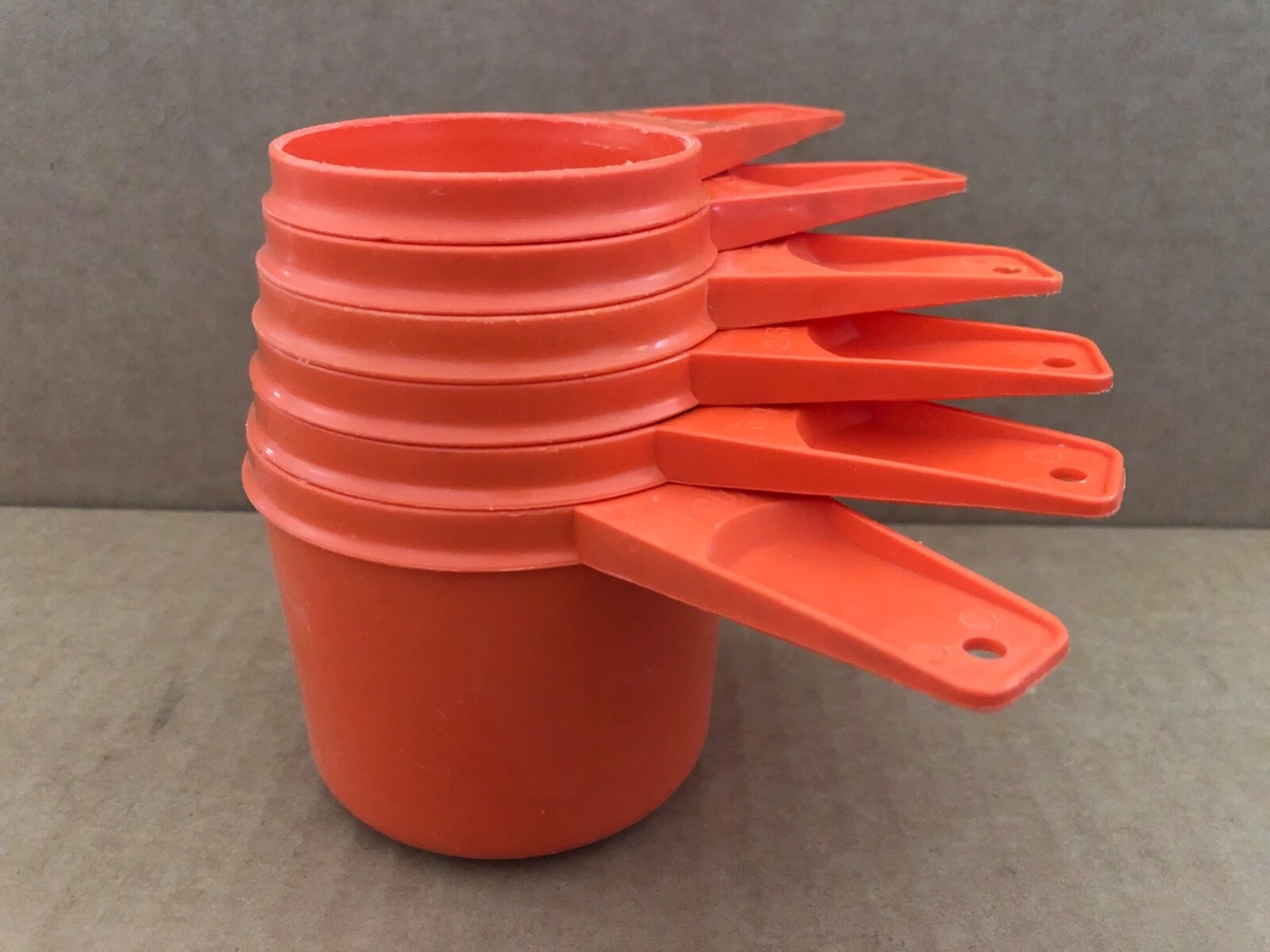 Vintage TUPPERWARE Orange Graduated Measuring Cups 6pcs 1/4 to 1 cup