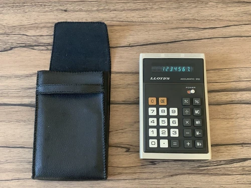 Calculatrice vintage LLOYD'S Accumatic 310 , E310 , fonctionnelle .