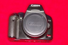 Canon Rebel XSi 12.2MP Digital SLR Camera with new battery, charger and strap.