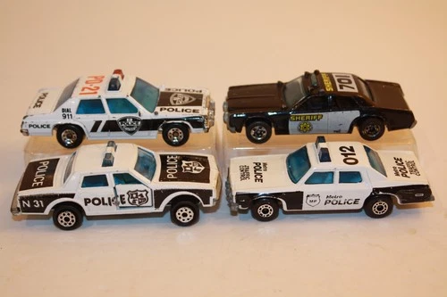 Four (4) Vintage 1970's - 1980's Matchbox / Hot Wheels / Majorette Police Cars
