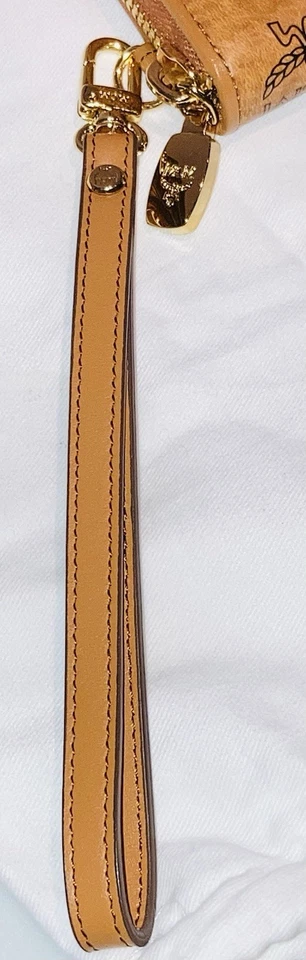 AUTÉNTICA PULSERA/CARTERA MCM VISETOS TACHONADA CREMALLERA GRANDE ALREDEDOR COÑAC ¡¡NUEVA SIN ETIQUETAS!!! Foto 2 de 4