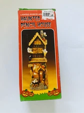 Haunted pencil orange light porcelain house 8”x3”