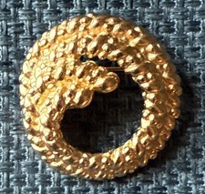 Spilla costume stile corda rotonda testurizzata tono oro Christian Dior vintage 