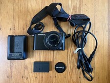 Olympus Pen Mini Mirrorless DSLR E-PM1, 12.3MPix- Battery, Charger, Strap, Cap