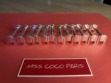 PORTES COUTEAUX 12   BOULANGER BETTY MÉTAL  ARGENTÉ TRÈS BEL ÉTAT 8x3 CM;