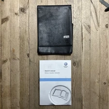 2009-2014 VW TRANSPORTER / CARAVELLE HANDBOOK MANUAL PACK & WALLET  2011 R20702