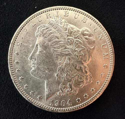 1904 O MORGAN DOLLAR AU Proof Like (Blemish on Eagles Chest)