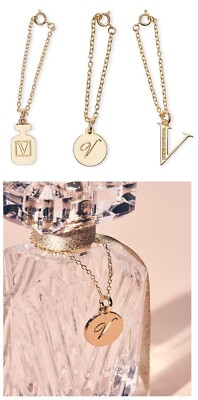 VICTORIAS SECRET PERFUME BOTTLE CHARM LOGO BOMBSHELL MONOGRAM GOLD PENDANT NWT