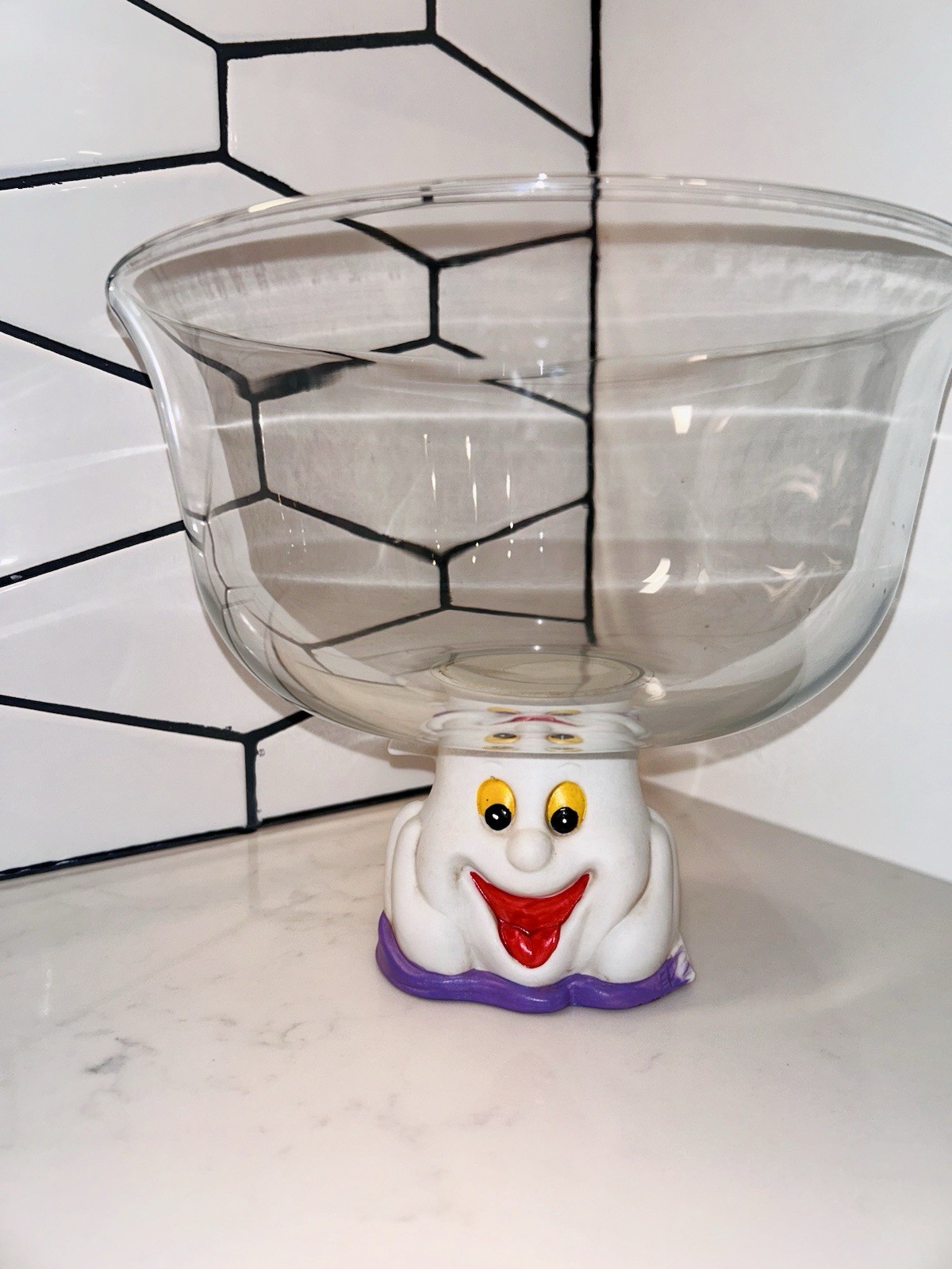Glass and ceramic pedestal punch bowl with a ghost face design