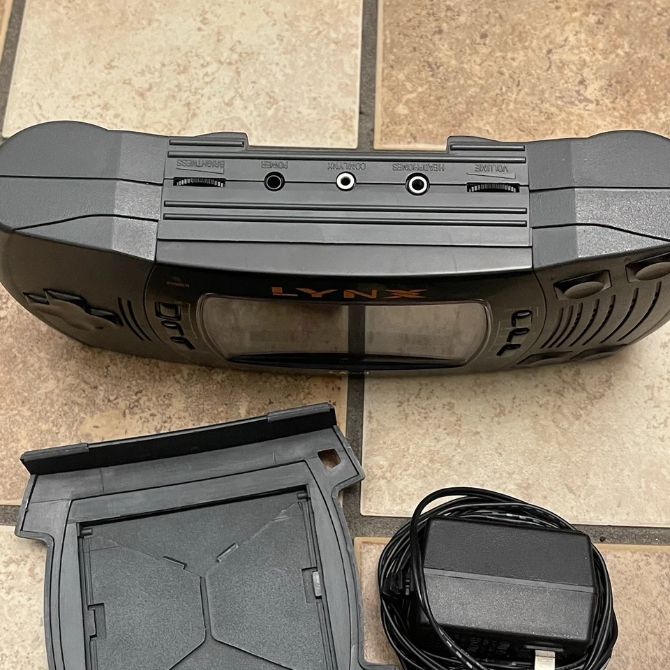 Sistema portátil Atari Lynx II PAG-0401 con cubierta de batería + cable de alimentación FUNCIONAMIENTO PROBADO Foto 3 de 4