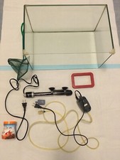AQUARIUM SET 10 GALLONS.LOCAL PICKUP ONLY.GOOD CONDITION.NICE.HAPPY FISH.SAFE