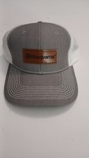 Husqvarna Snap Back Truckers Hat. Adjustable. Grey And White.