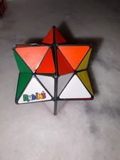 This is a shape-shifting puzzle known by names such as the Star Cube or Rubik's