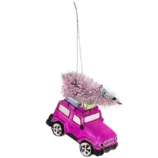 Blown glass ornament, pink Jeep with Christmas Tree on the top.