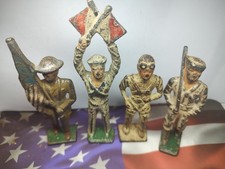 4 Cast Iron Toy Soldiers